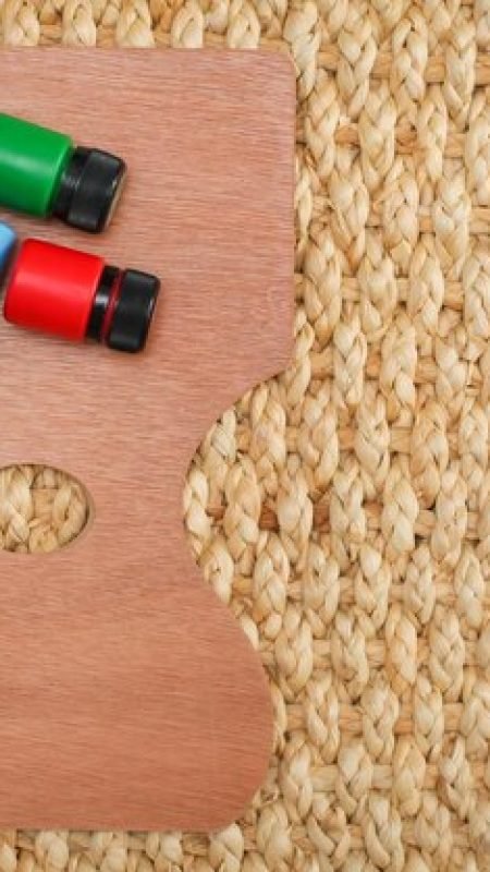 directly-view-colorful-paints-palette-textured-fabric_1048944-7636159